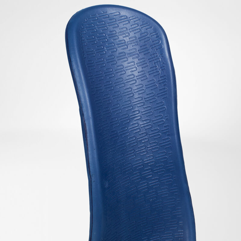 Close-up van blauw getextureerd kussen van de CaligaLoc enkelspalk voor comfort.