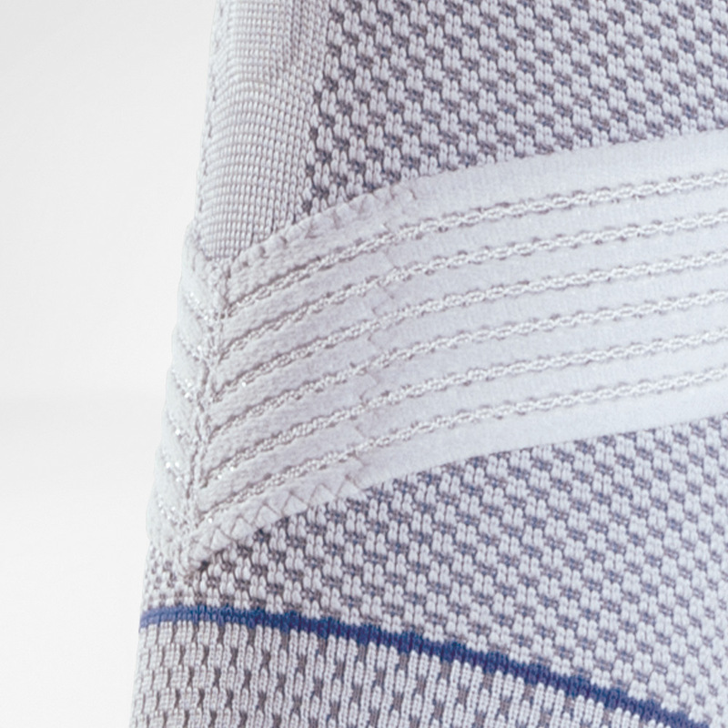 Close-up van Train-breisel van Bauerfeind OmoTrain schouderbrace voor ademend comfort.